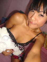 Ladyboy amateur flashes her tits at the mini mart - Asian ladyboys porn at Thai LB Sex