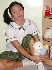 Petite dickgirl lifting her school skirt to flash her pecker - Asian ladyboys porn at Thai LB Sex