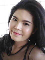 23 year old horny Thai ladyboy with raven hair andfake boobs striptease - Asian ladyboys porn at Thai LB Sex